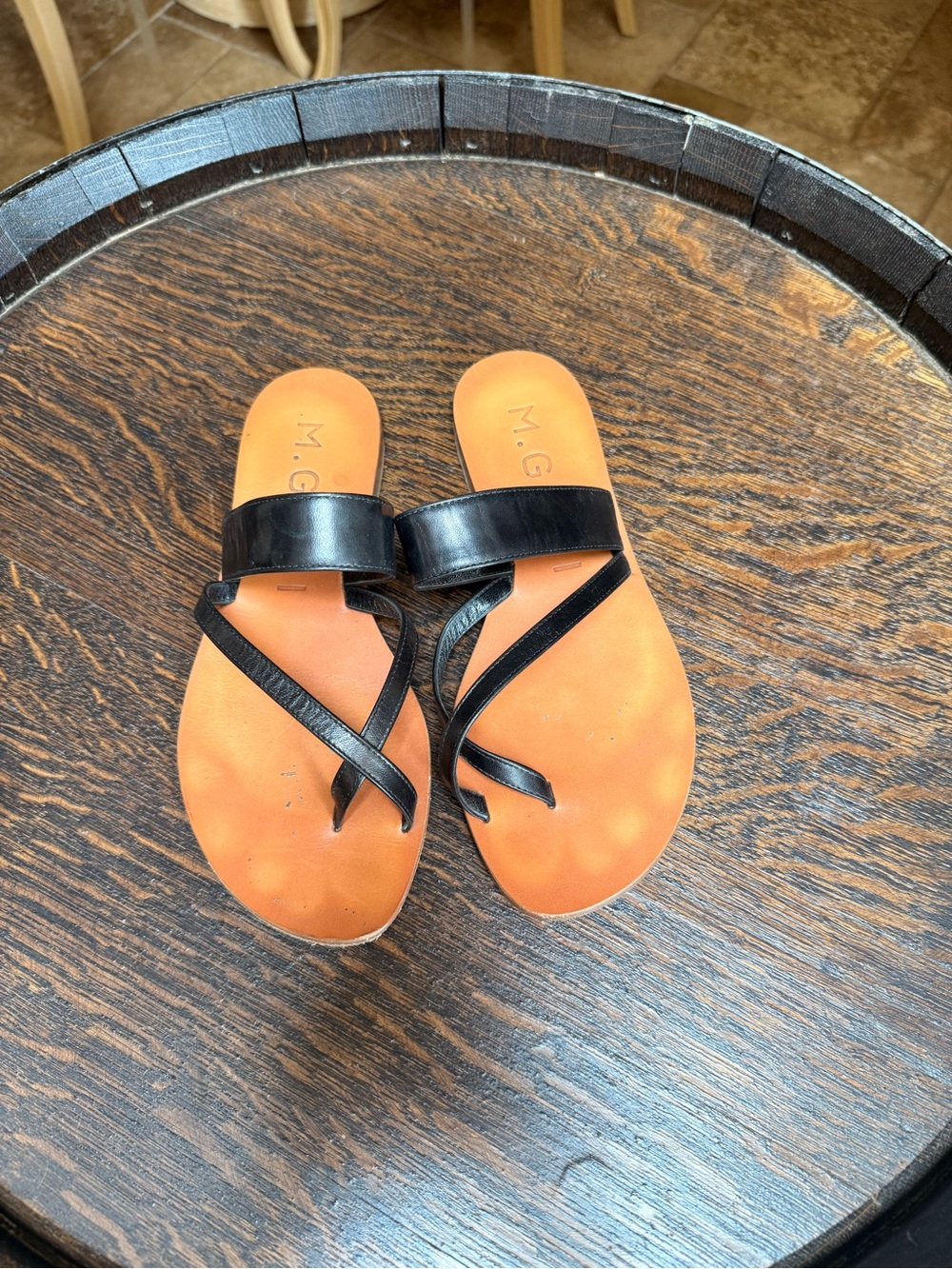M. Gemi Black Leather Cross-Strap Slide Sandals with Tan Footbed